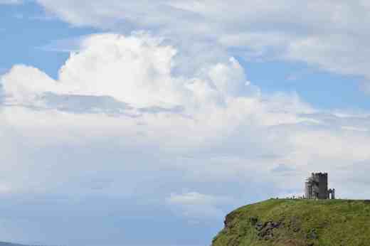 O'Brien's Tower on the cliff edge, looking as though it is in the clouds