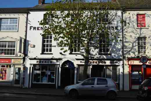 French's is one of those shops that you just wouldn't see anywhere else but Ireland. On the right is a busy, serious drinkers' bar. On the left is an agricultural merchant.