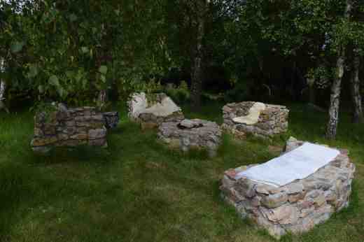 Stones seats the perfect distance around a fire pit (I suspect)